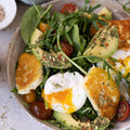 Breakfast salad with poached egg on avocado made with the Avo Smash Lover Gift Hamper
