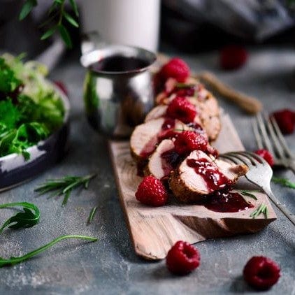 Pork tenderloin with raspberry balsamic sauce made with Tweed Real Food Wild Raspberry Splash